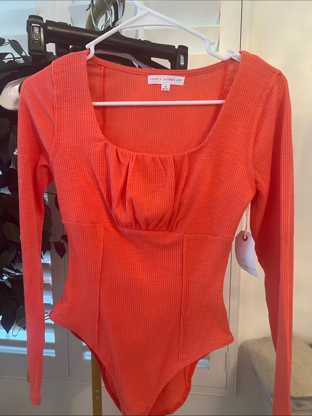 Coral Ribbed Long-Sleeve Bodysuit